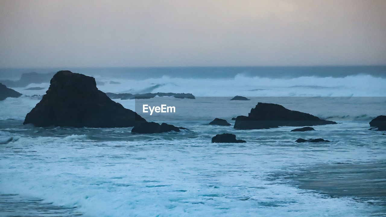 sea, water, ocean, wind wave, wave, sky, coast, land, beauty in nature, scenics - nature, beach, nature, rock, environment, horizon, landscape, motion, shore, seascape, no people, tranquility, travel destinations, iceberg, outdoors, bay, horizon over water, travel, tranquil scene, cloud, coastline, sunset, long exposure, blue, body of water, ice, cold temperature