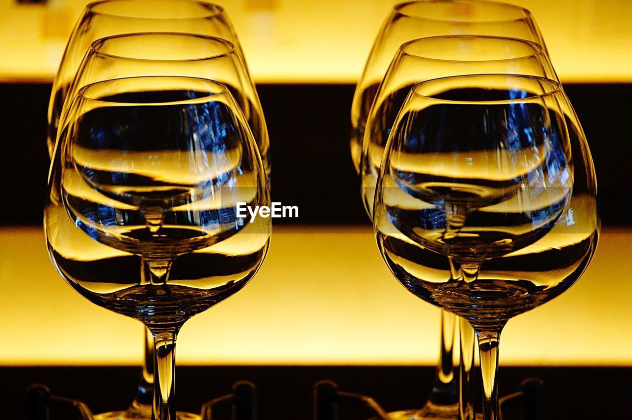 Close-up of empty wineglasses on table