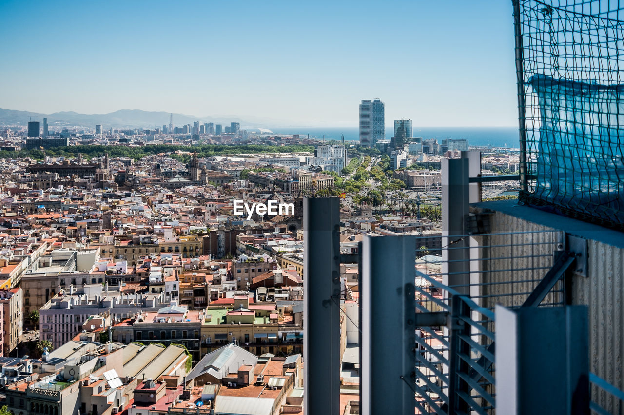 VIEW OF CITYSCAPE WITH BUILDINGS IN BACKGROUND