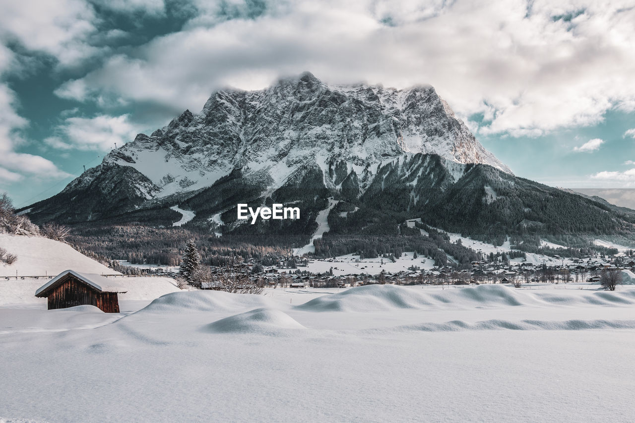 Panoramic view of the zugspitze and ehrwald in winter.