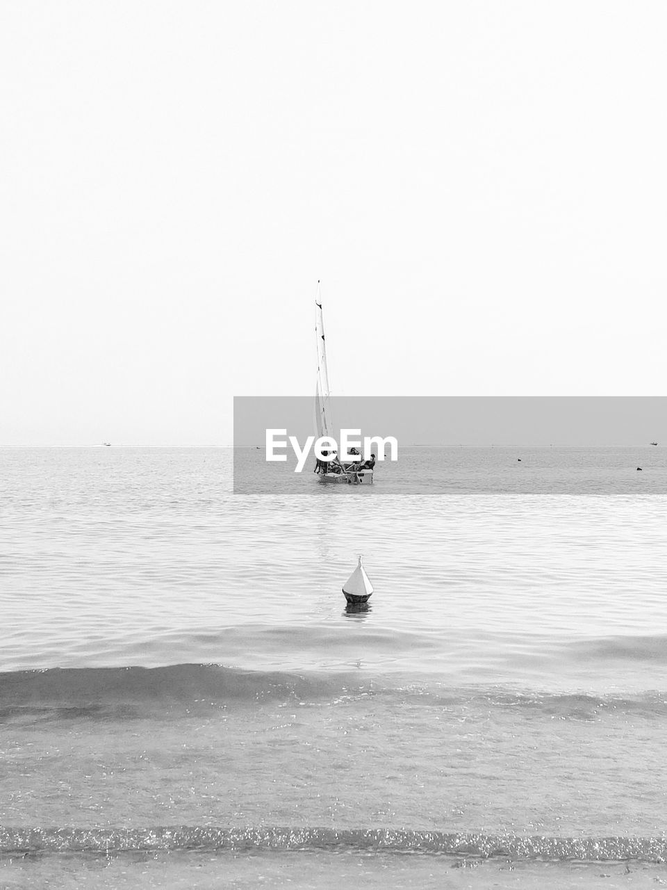 SAILBOAT ON SEA AGAINST CLEAR SKY