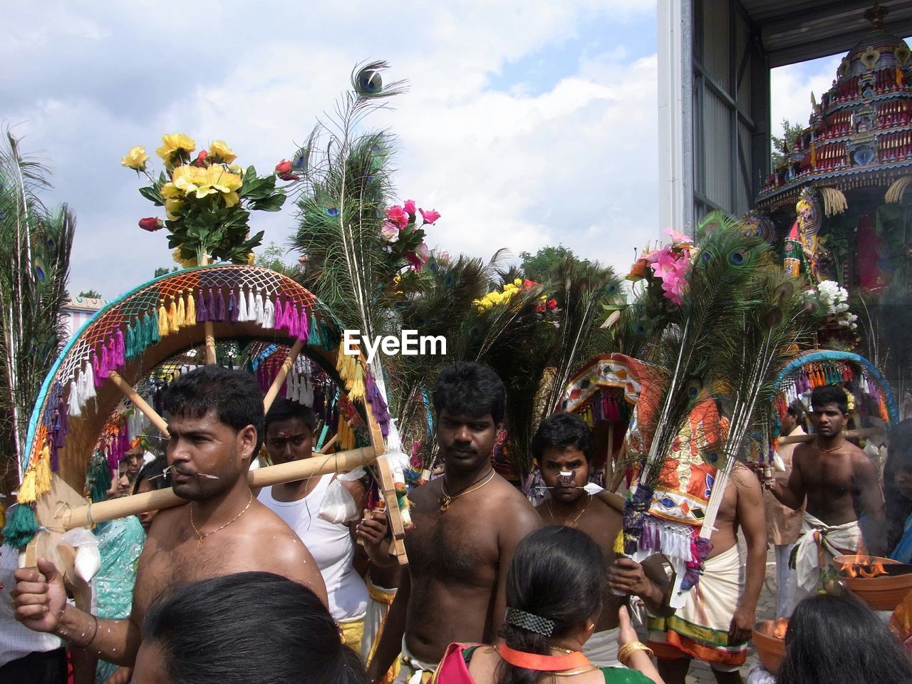 PEOPLE ENJOYING AT AMUSEMENT PARK