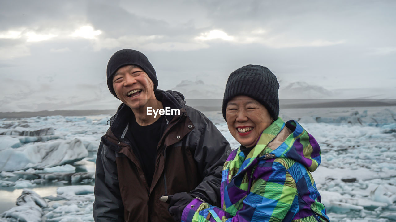 Portrait of smiling couple during winter