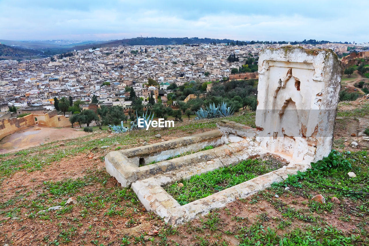 Cemetery at fes el bali against cityscape