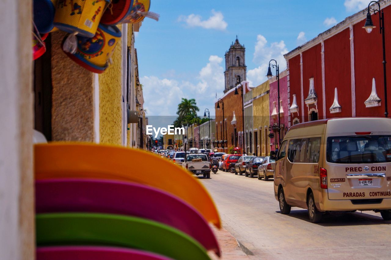 VIEW OF CARS ON CITY STREET