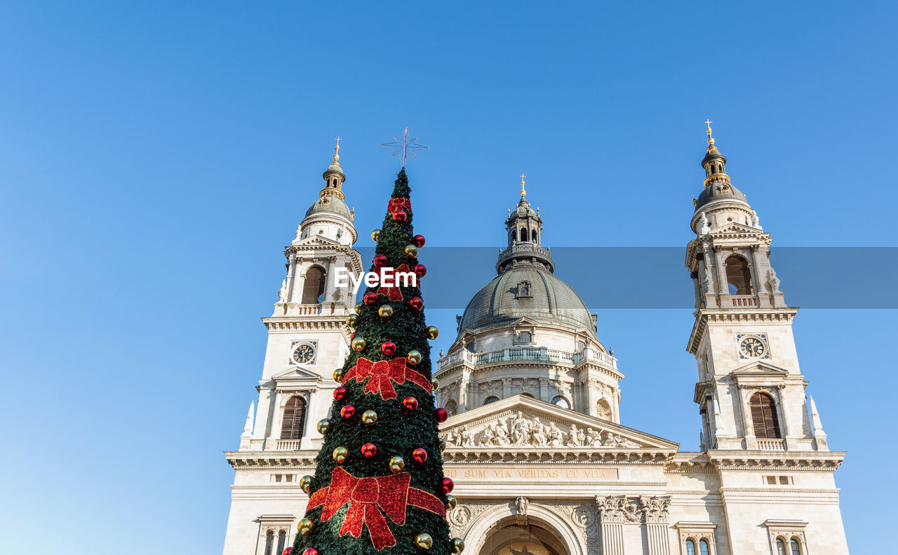 Christmas tree in front of saint stephen's basilica or szent istvan bazilika in budapest, hungary