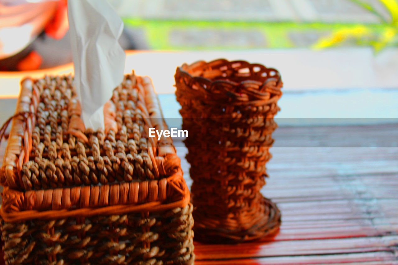 Close-up of wicker basket on table