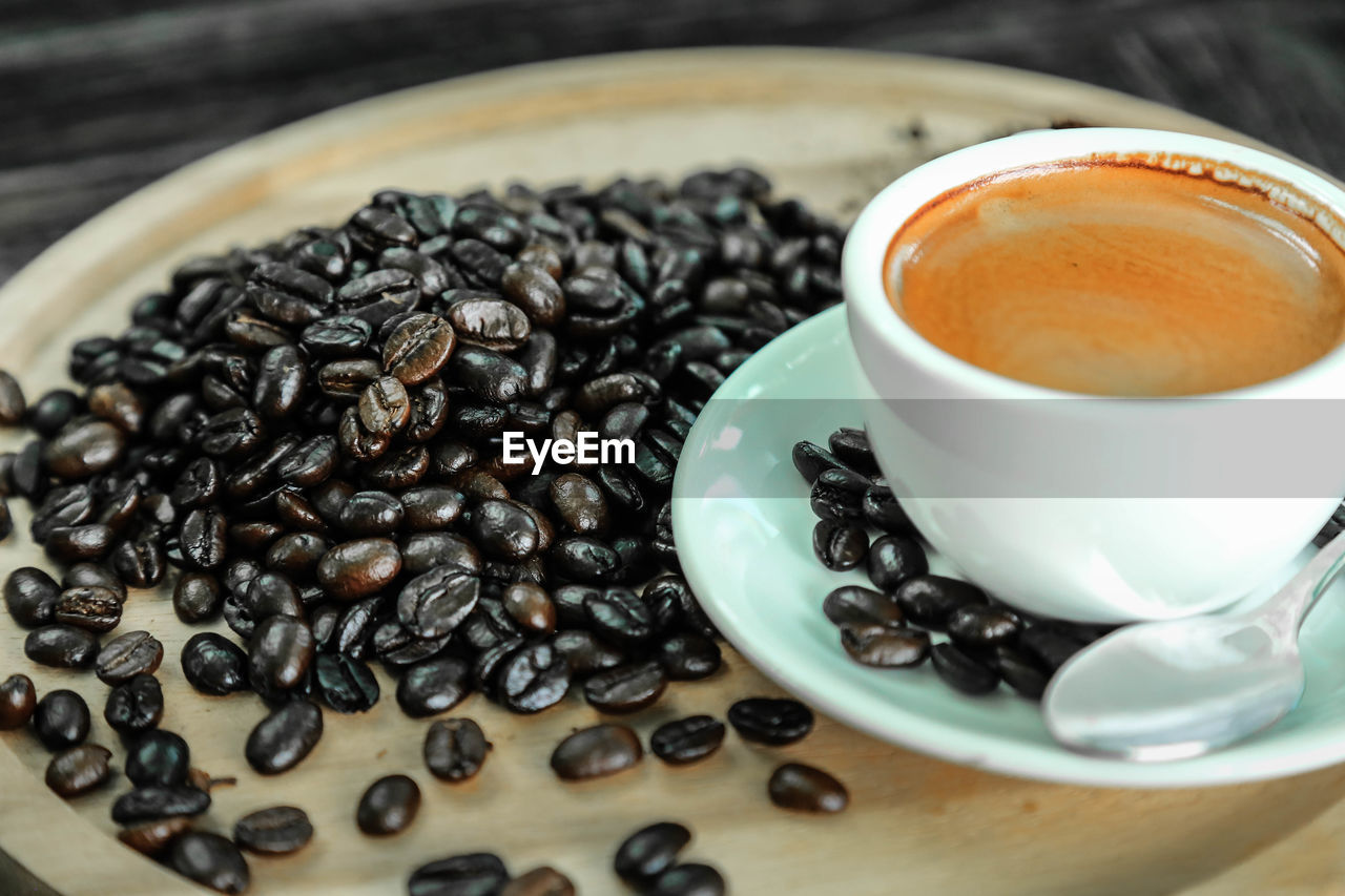 Close-up of coffee cup on table