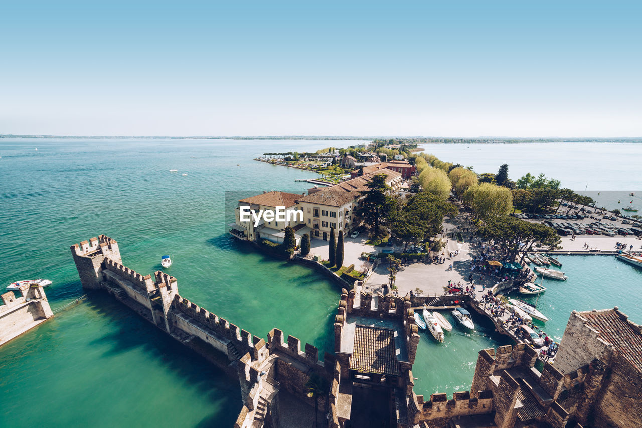 High angle view of buildings amidst sea