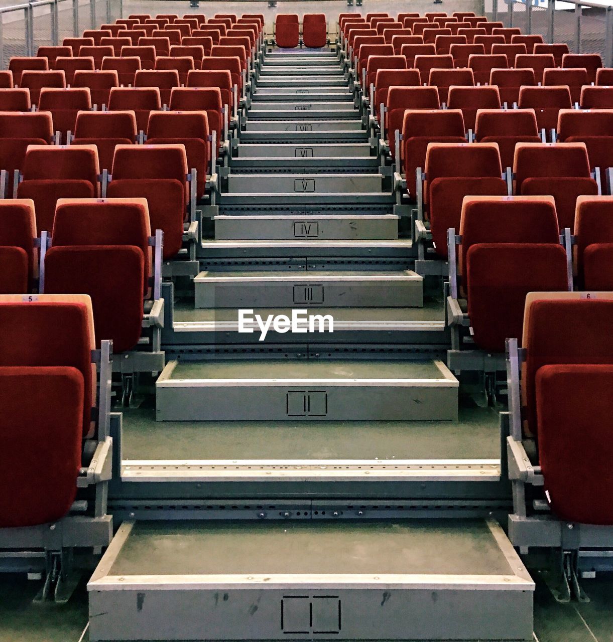 Empty chairs arranging at auditorium