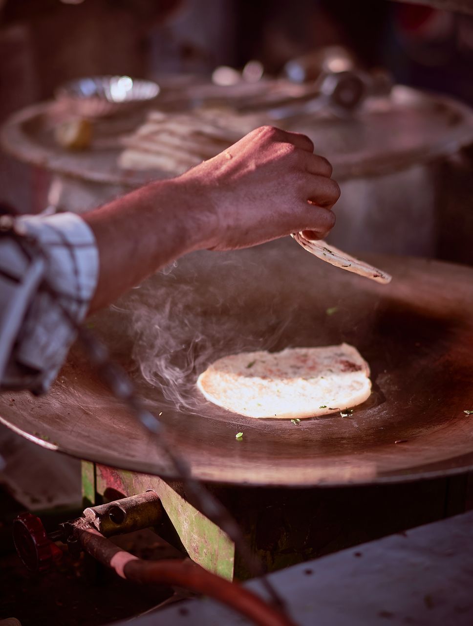 Midsection of man preparing food