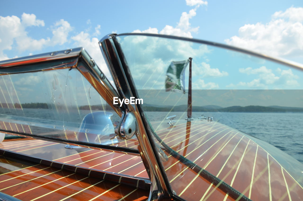 View of lake and sky from speedboat 