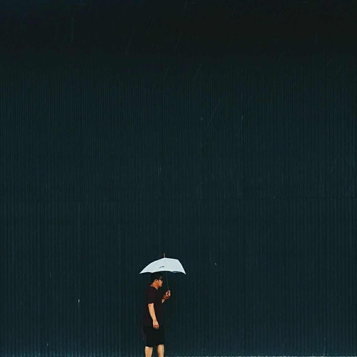 rain, protection, outdoors, one person, night, under, real people, below, nature, people