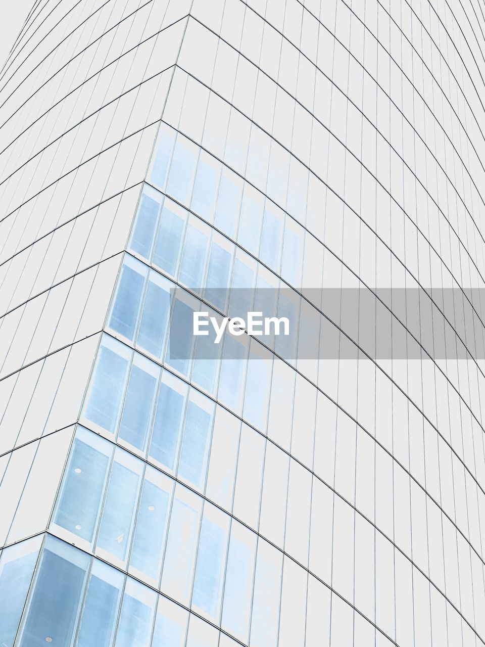 architecture, built structure, building exterior, office building exterior, glass, office, building, city, reflection, skyscraper, pattern, no people, window, facade, sparse, business, backgrounds, low angle view, futuristic, nature, geometric shape, line, outdoors, day, shape, blue, full frame, sky, daylighting