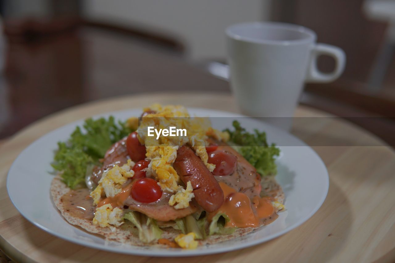 Close-up of breakfast served in plate