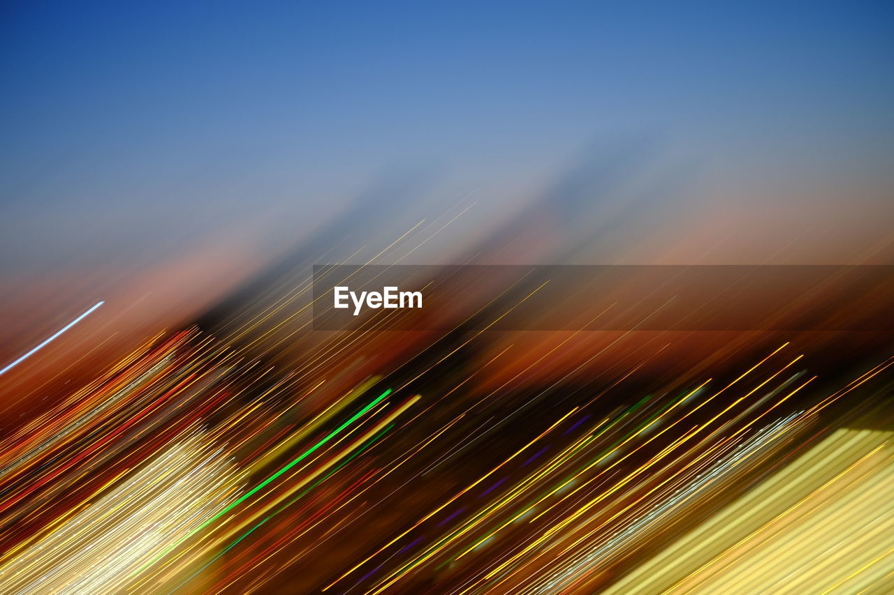 Close-up of light trails against sky