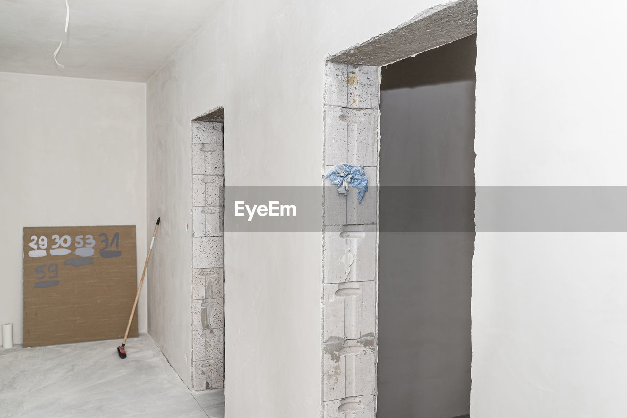 Freshly laid gypsum on the walls and ceiling of a newly built detached house.