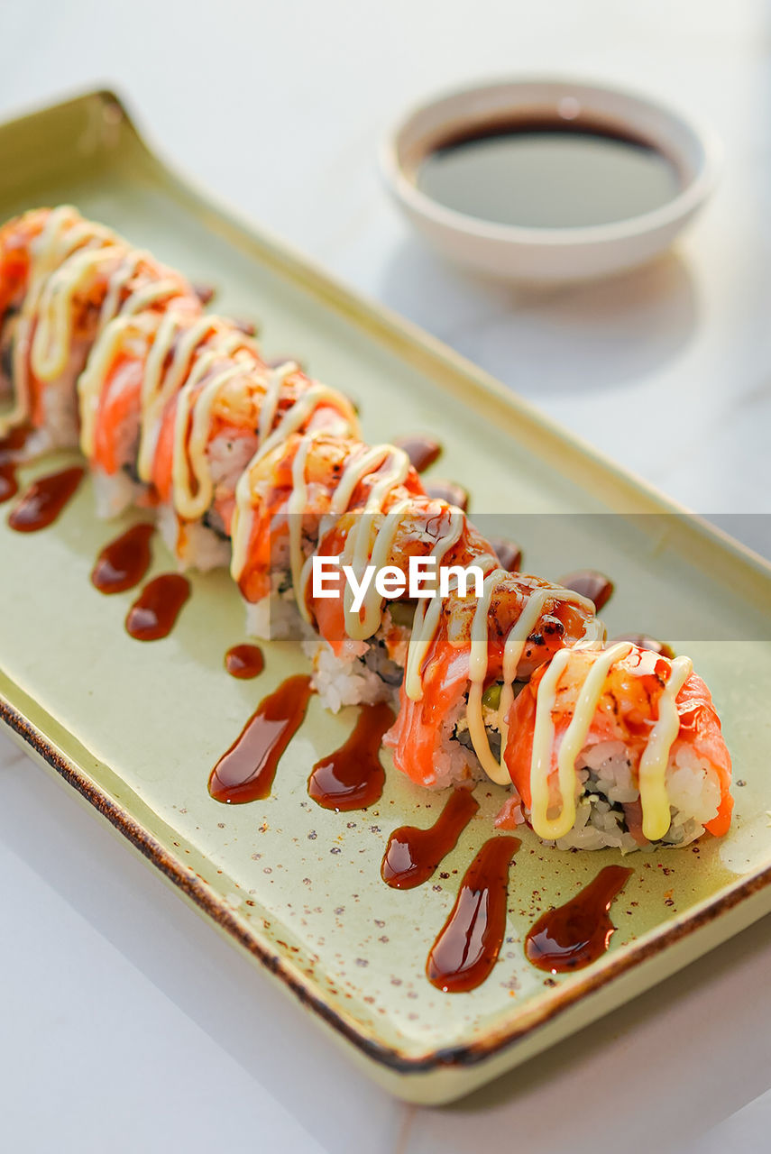 close-up of sushi served in plate on table