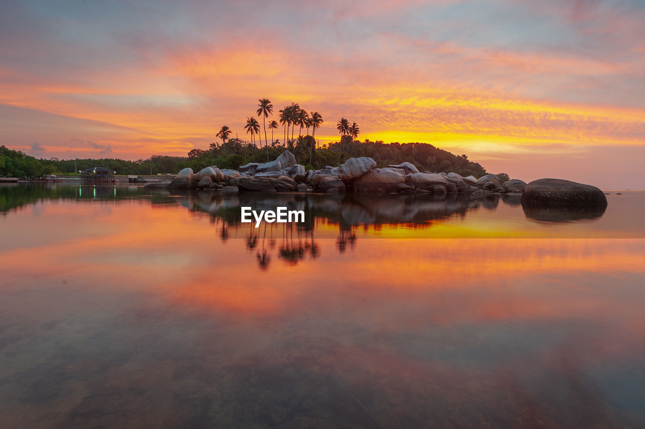 scenic view of lake during sunset