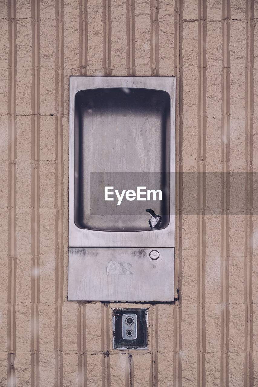 Directly above shot of abandoned drinking fountain