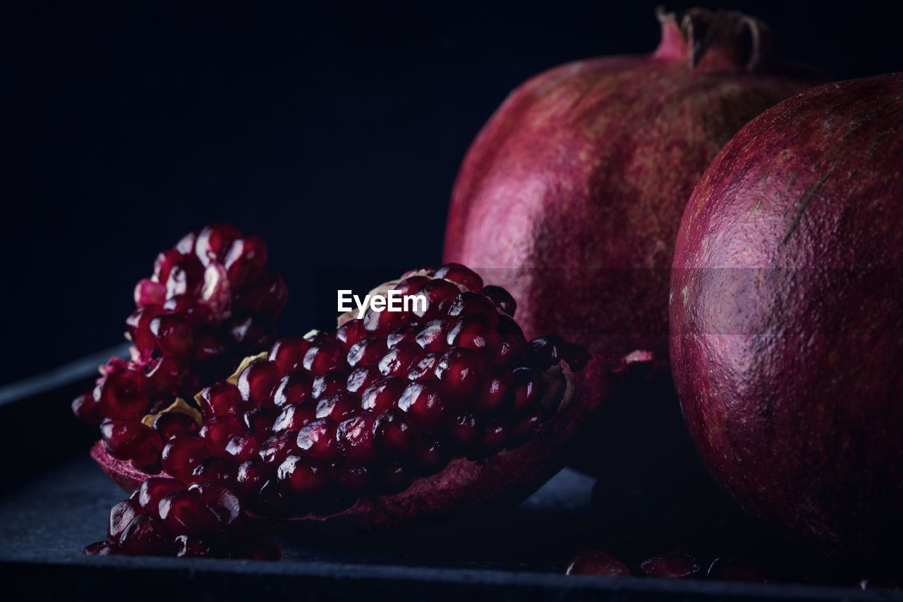 CLOSE-UP OF FRUITS ON TABLE