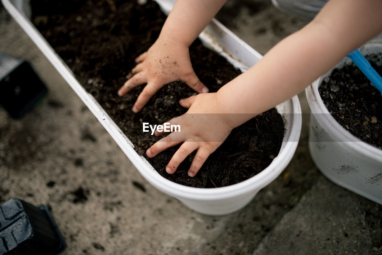 Little girl have fun in the garden.