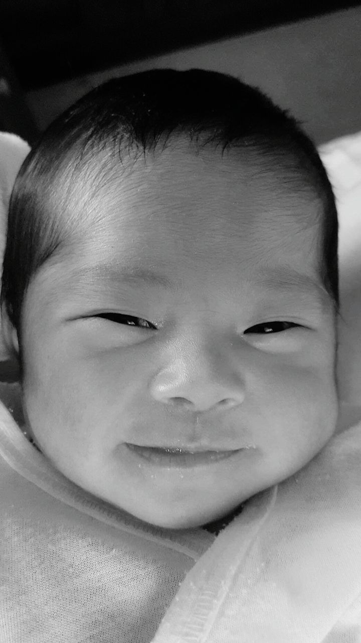 Close-up portrait of cute baby girl
