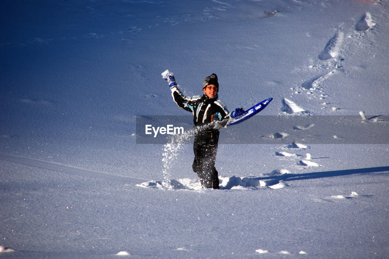 PERSON SKIING ON SNOW