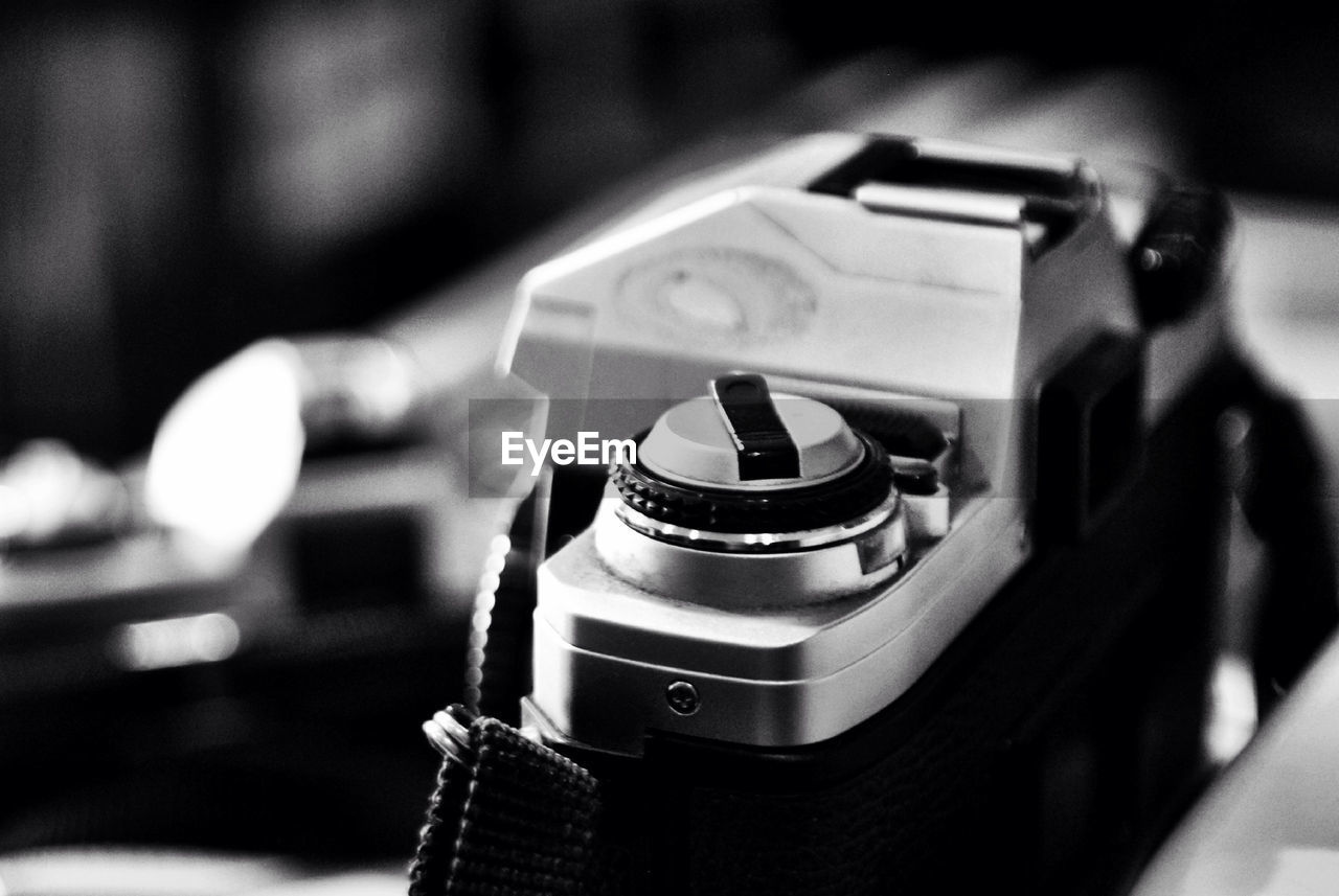 Close-up of vintage camera on table