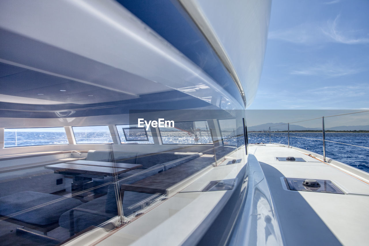 View from the deck of the saloon onboard a cruising catamaran by a bea
