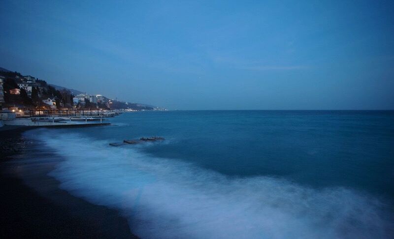 VIEW OF SEA AGAINST BLUE SKY