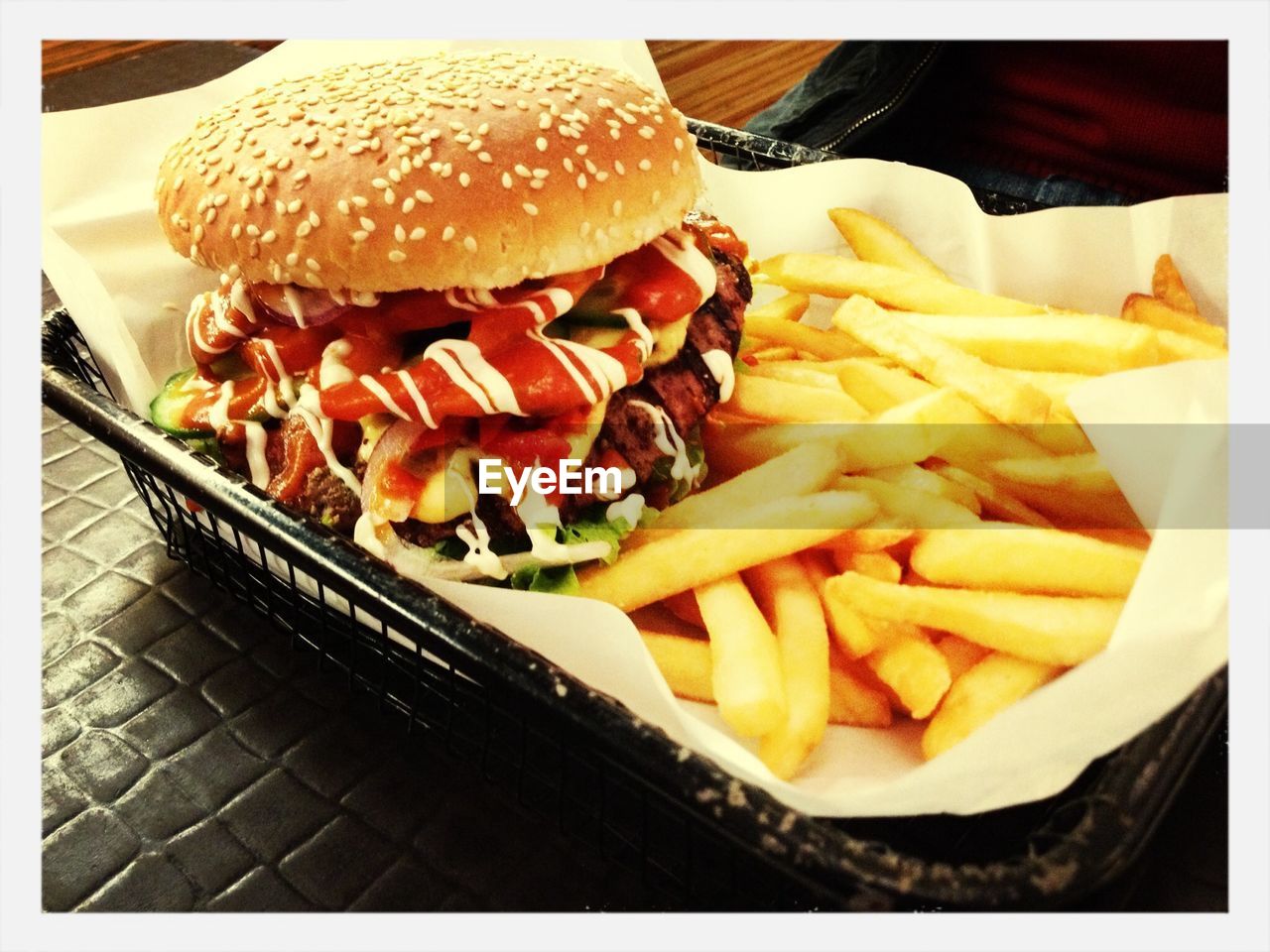 Close-up of fries with ham burger