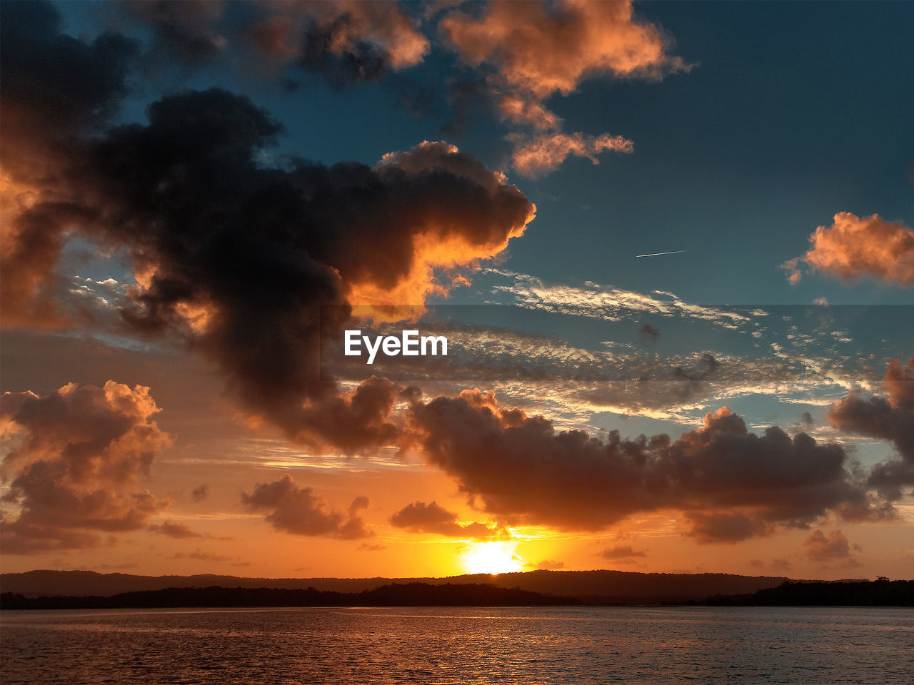 SCENIC VIEW OF SEA DURING SUNSET