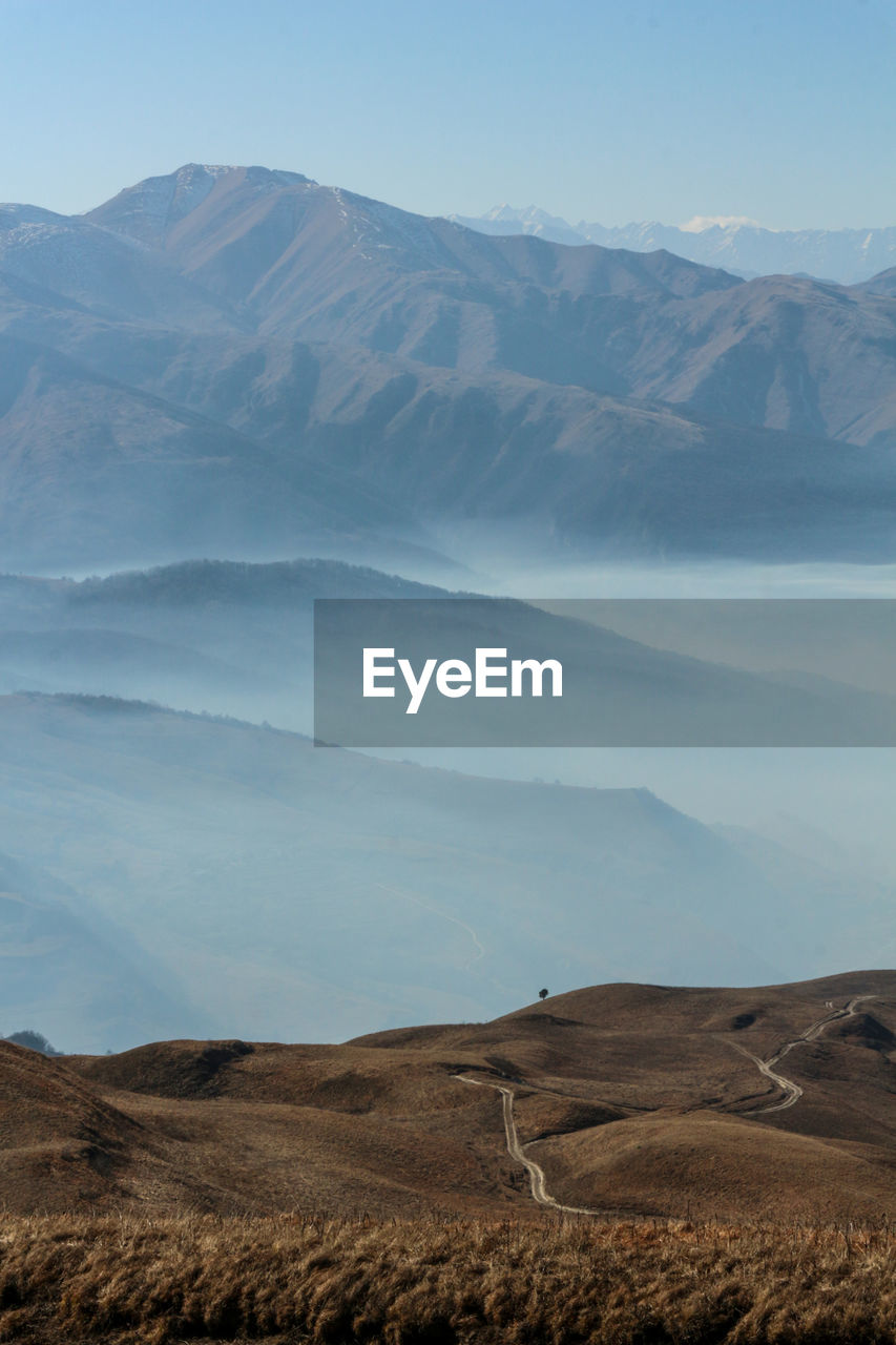 Scenic view of mountains against sky