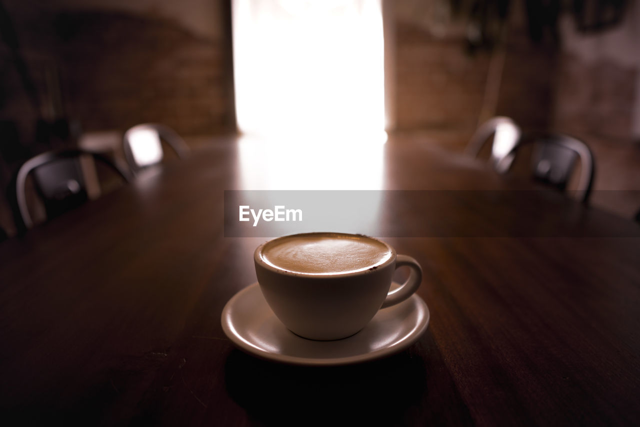 CLOSE-UP OF COFFEE ON TABLE