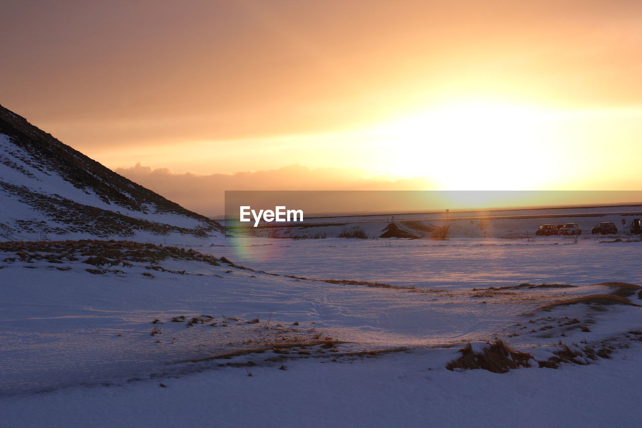 SCENIC VIEW OF SEA DURING SUNSET