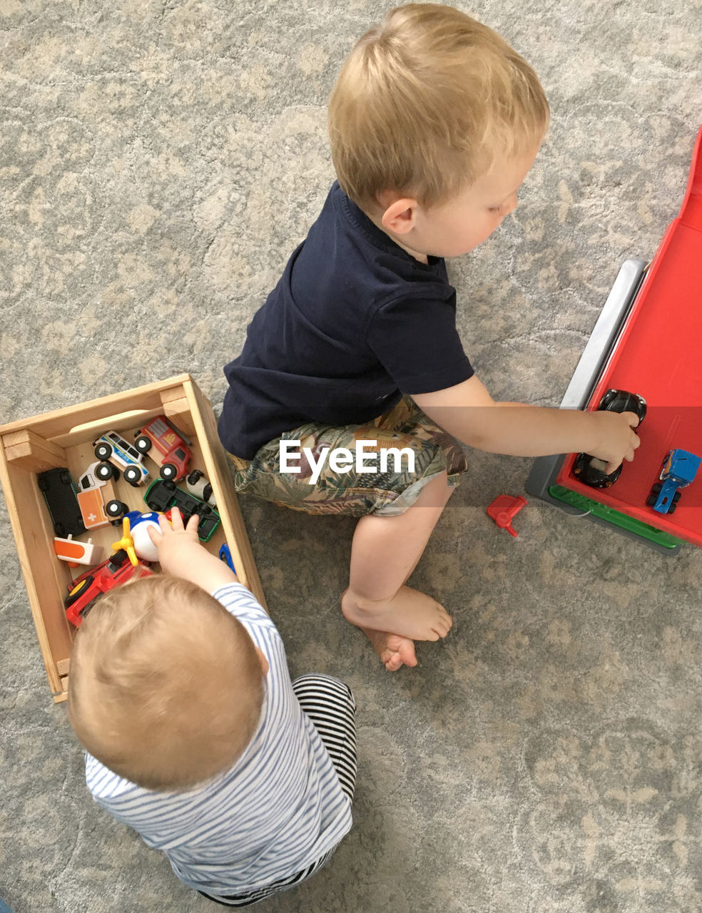 High angle view of children playing on floor