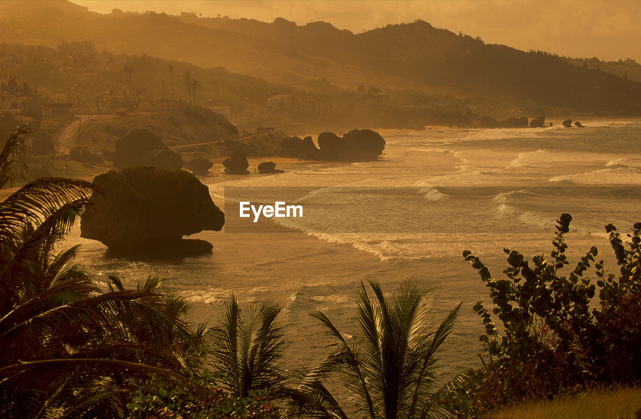 Scenic view of sea against sky during sunset