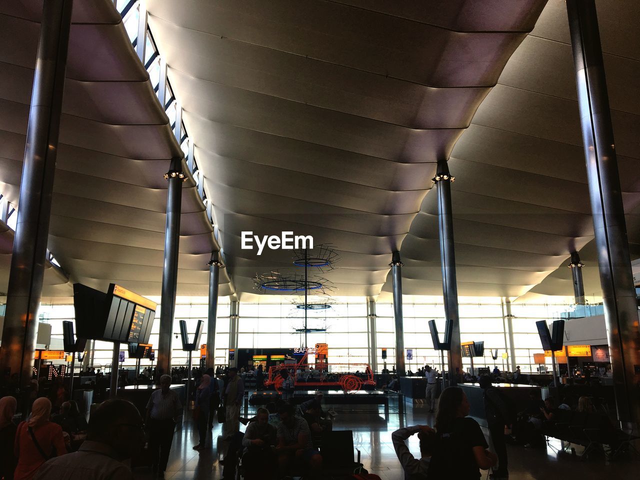 GROUP OF PEOPLE ON AIRPORT