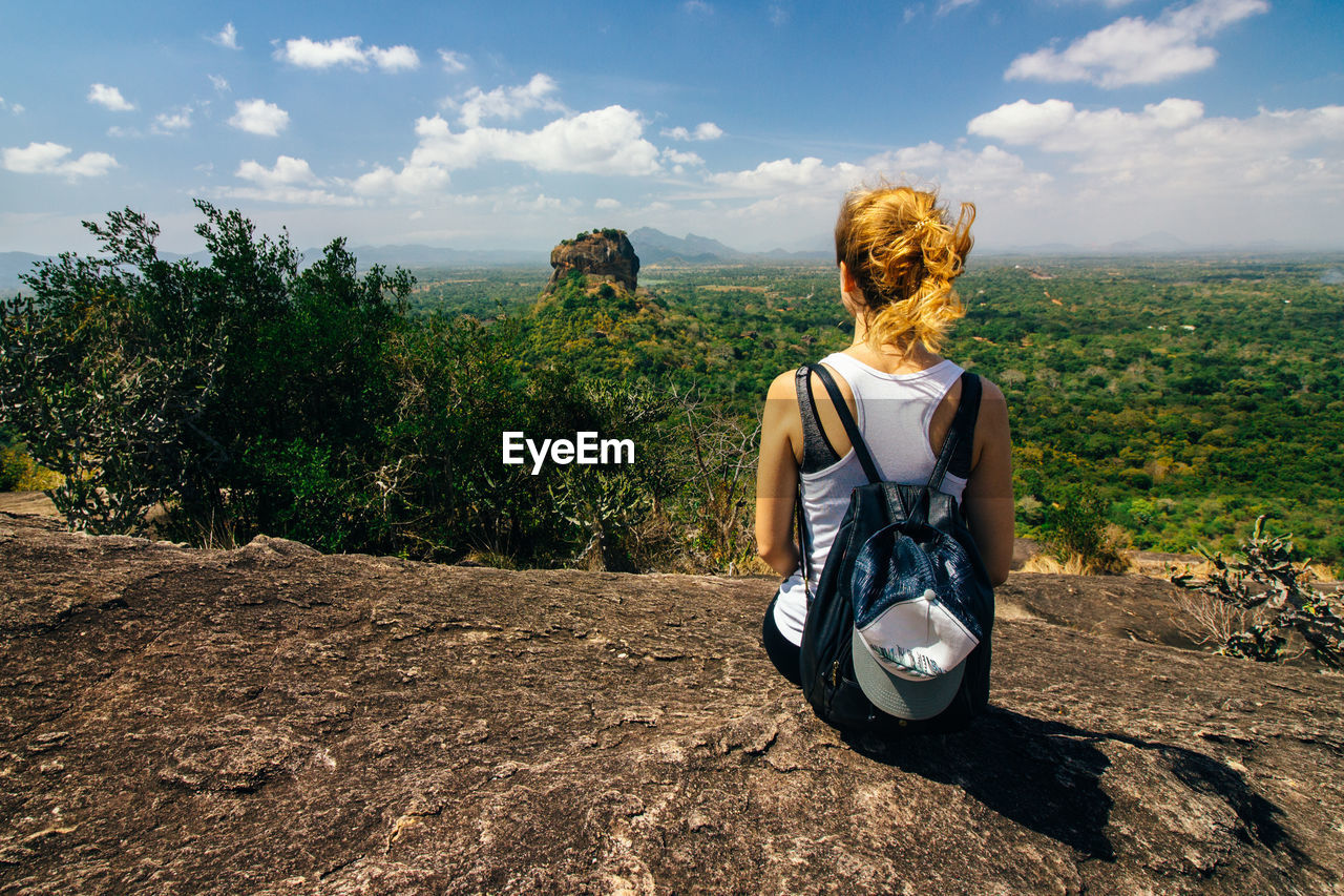 Rear view of female tourist in sri lanka