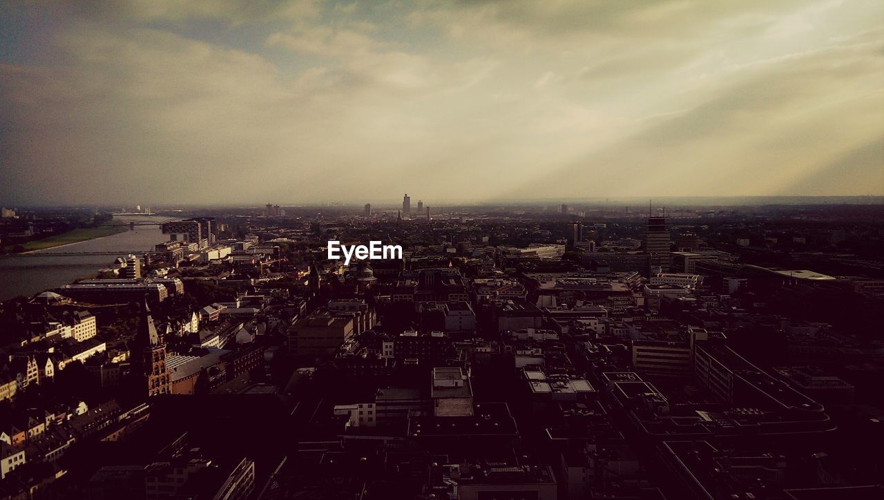 Aerial view of cityscape at dusk