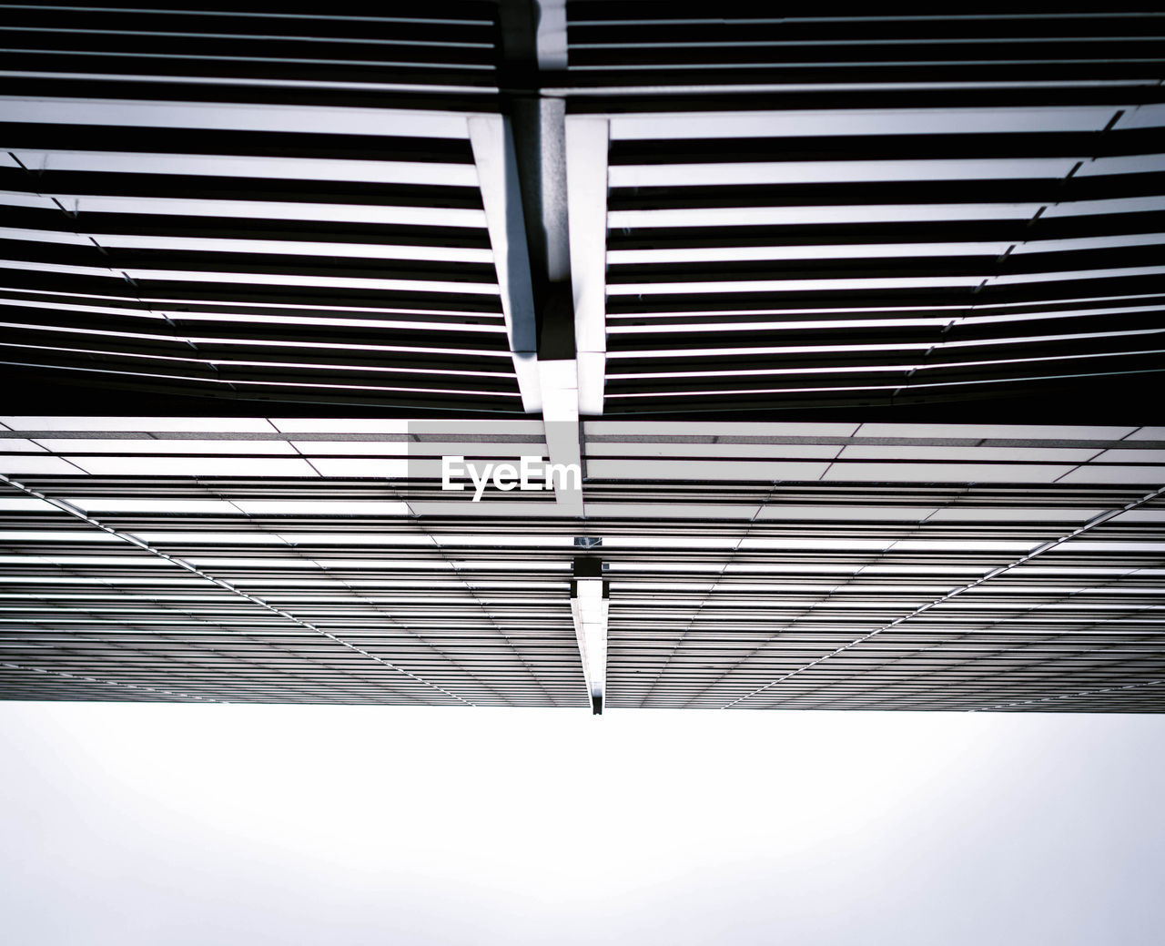 Low angle view of metal structure against sky