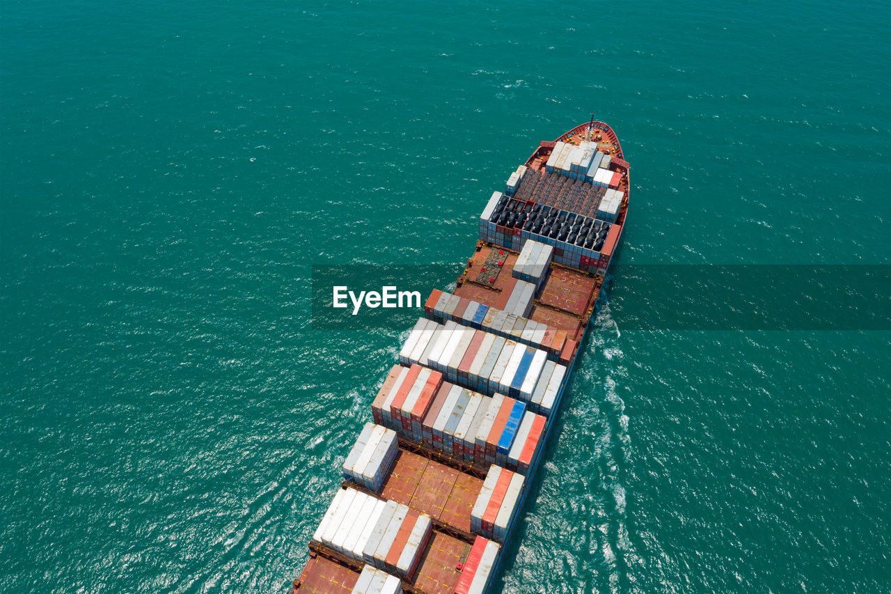 HIGH ANGLE VIEW OF SHIP AT SEA