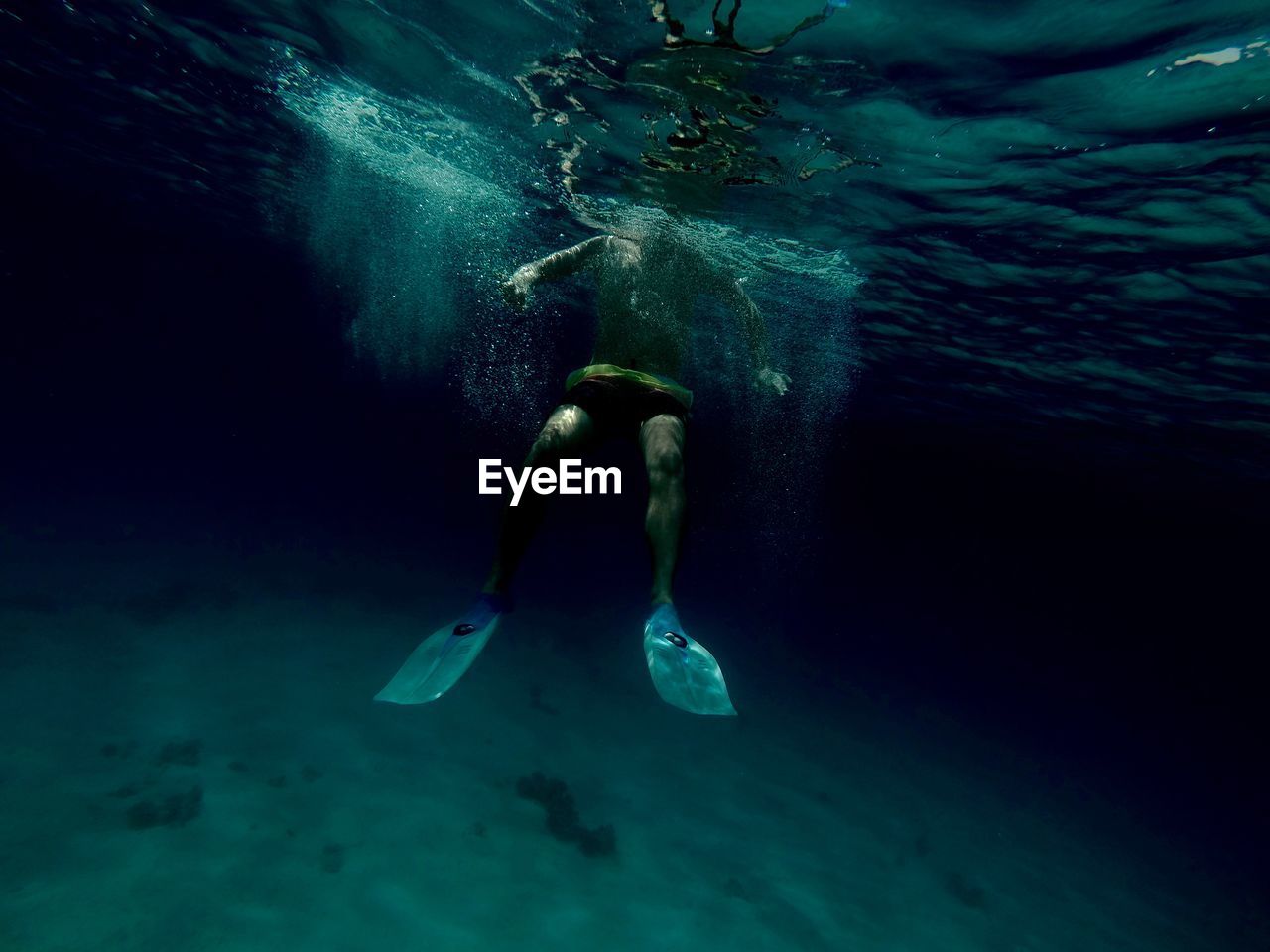 Man swimming in sea