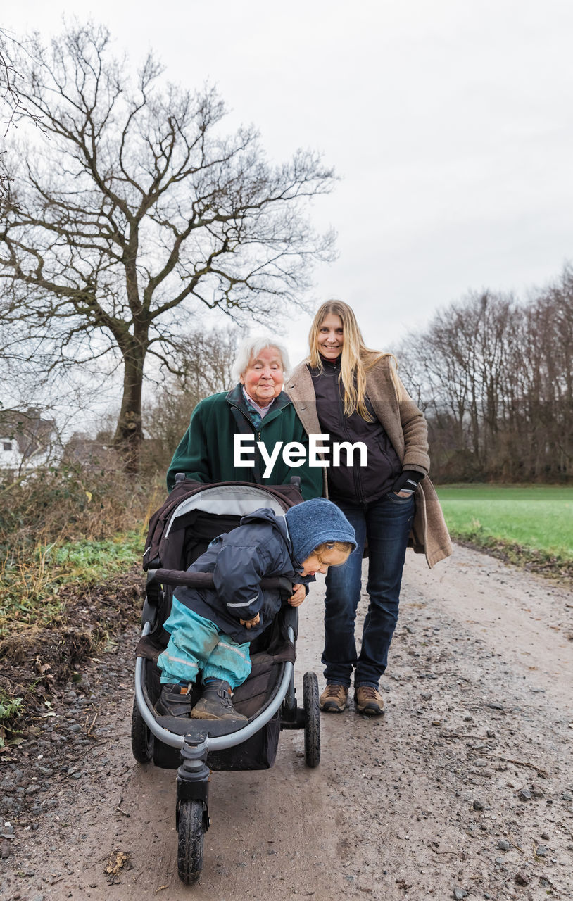 Female family on dirt road