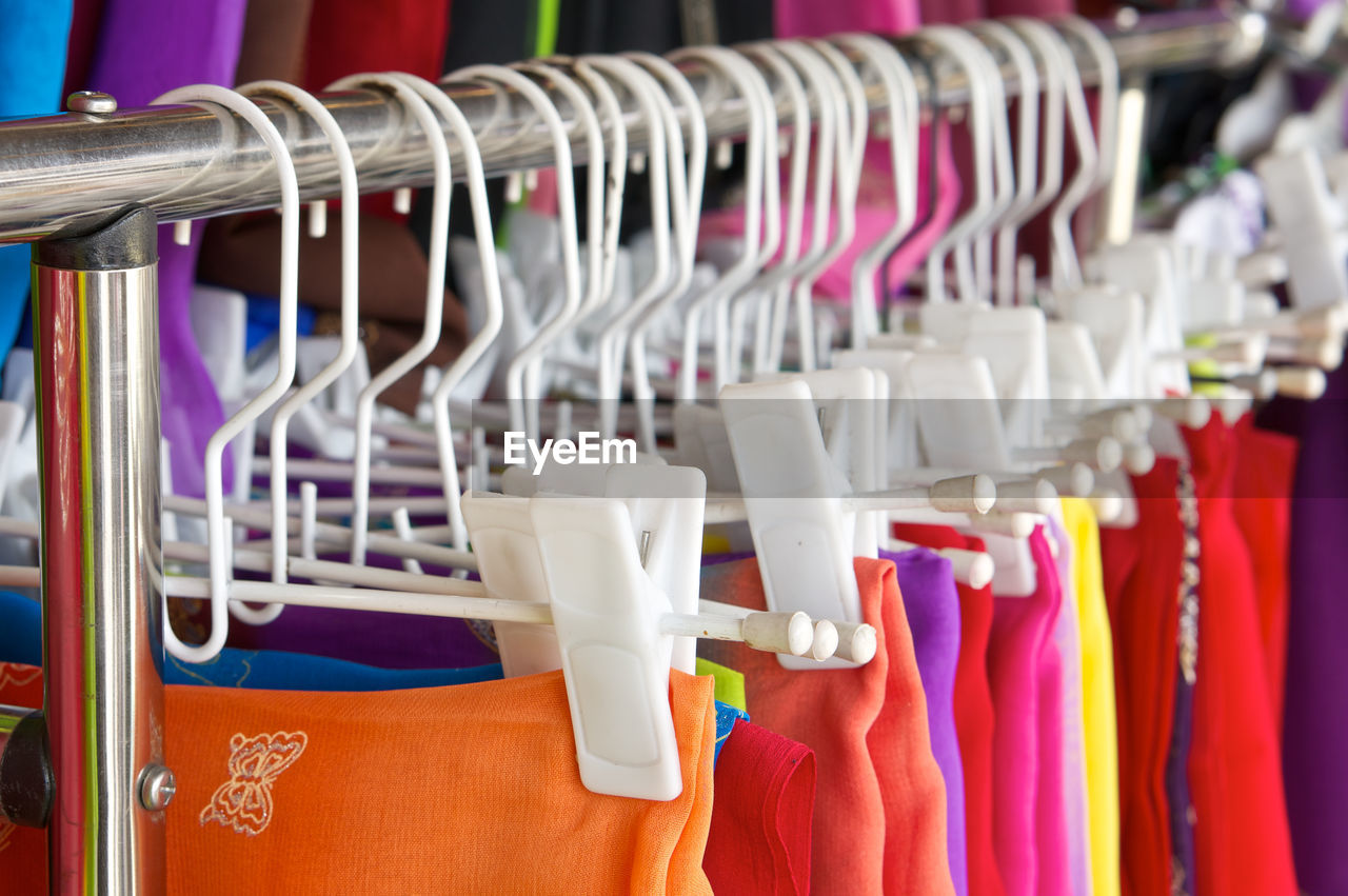 Close-up of dresses for sale in market