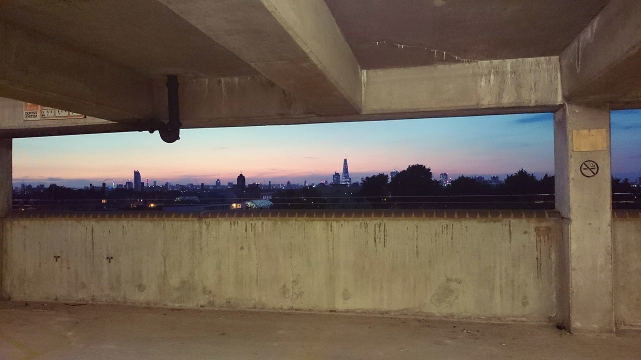 Cityscape seen from bridge during sunset