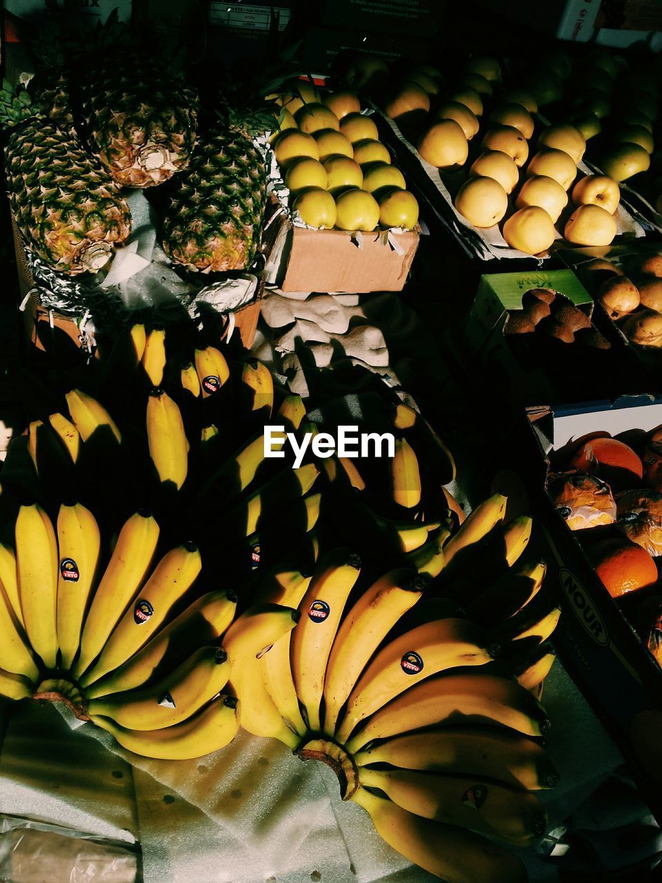 High angle view of various fruits for sale at market stall