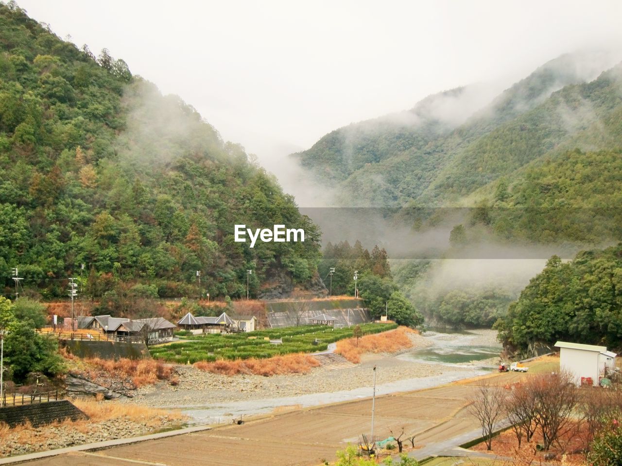 Scenic view of mountains during foggy weather