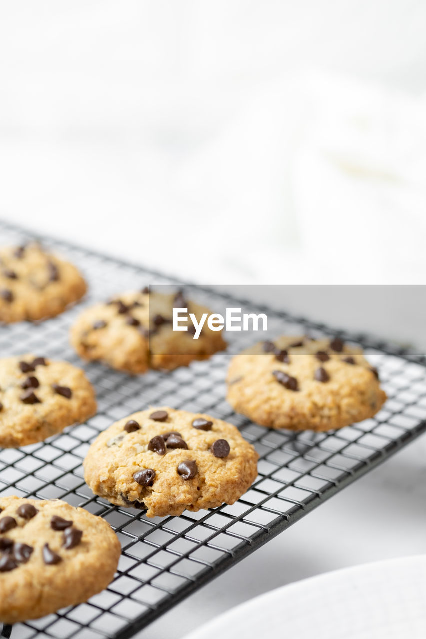 CLOSE-UP OF COOKIES ON WHITE BACKGROUND